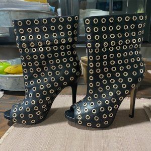 aldo ankle black and gold boots